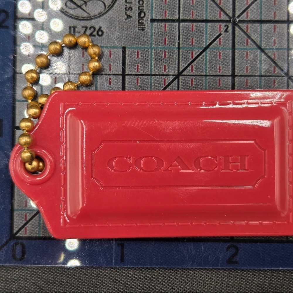 Coach Cherry Red Bag Tag with Gold Chain
